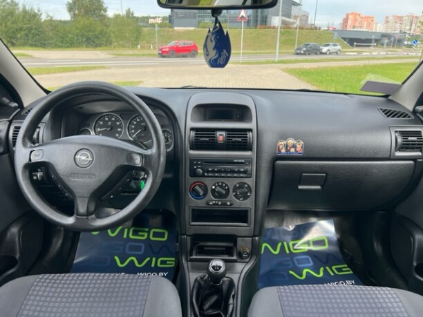 Opel Astra фото 12
