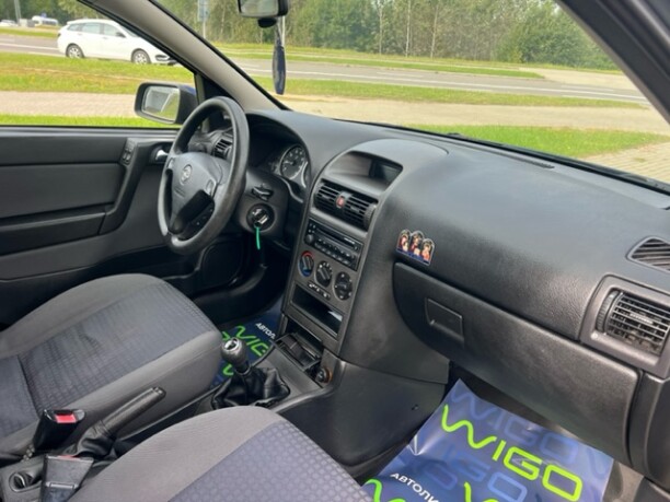 Opel Astra фото 10