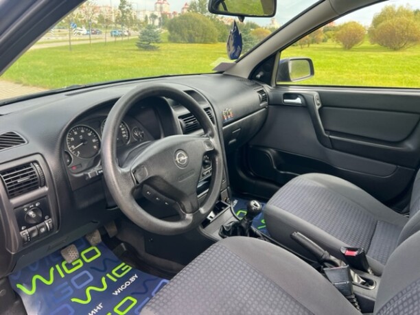 Opel Astra фото 9