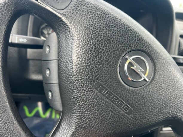 Opel Astra фото 15
