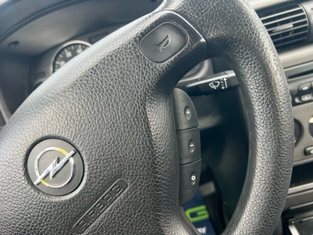 Opel Astra фото 16