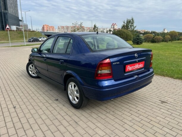 Opel Astra фото 7